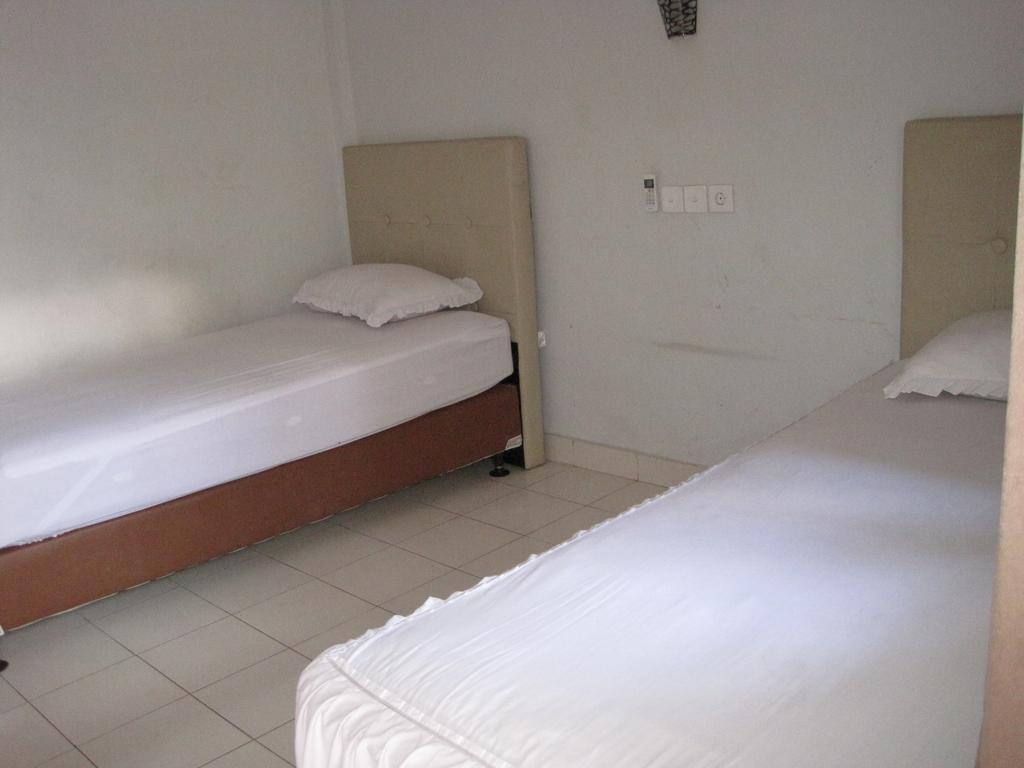 Taman Mekar Beach Inn Kuta Lombok Værelse billede